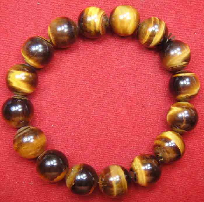 สร้อยข้อมือหินสีอัญมณี “ไทเกอร์อายส์ (Tiger eye stone)” แก้ปีชง 2558 ขนาด 13 ม.ม. สวยจริง ถูกกว่า...