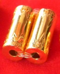 คู่ตะกรุดทอง 90 % สำหรับร้อยสร้อย (ไม่มีห่วง) ยาวประมาณ 1.3 cm นน.ประมาณ 1.6 g 