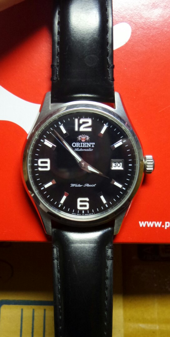 นาฬิกา โอเรียนออโตเมติกพร้อมสายหนังเดิมเคาะเดียวครับ