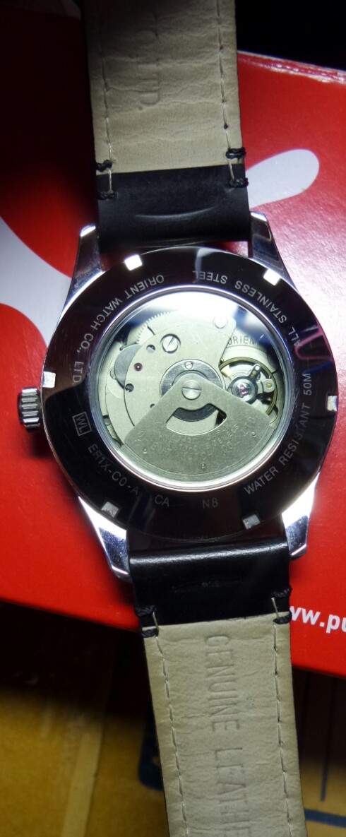 นาฬิกา โอเรียนออโตเมติกพร้อมสายหนังเดิมเคาะเดียวครับ