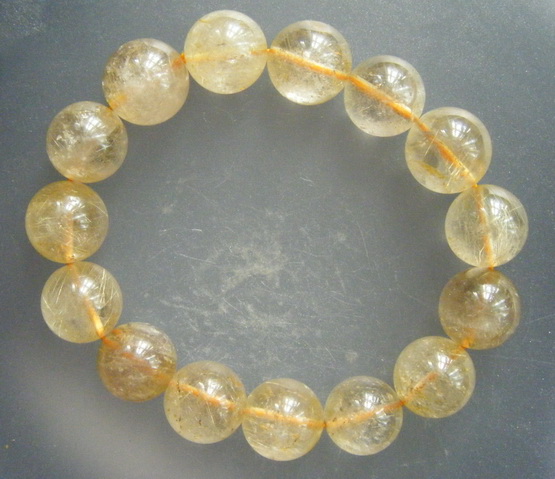 กำไล แก้วไหมทอง ขนาดเม็ด 14 ม.ม.