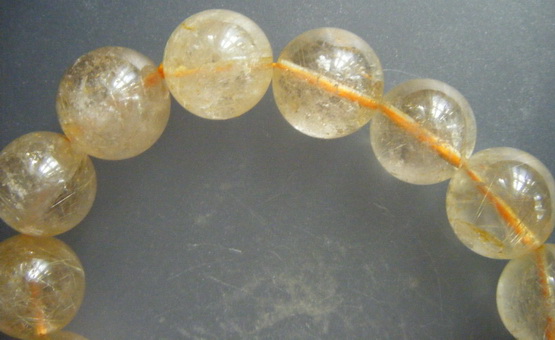 กำไล แก้วไหมทอง ขนาดเม็ด 14 ม.ม.