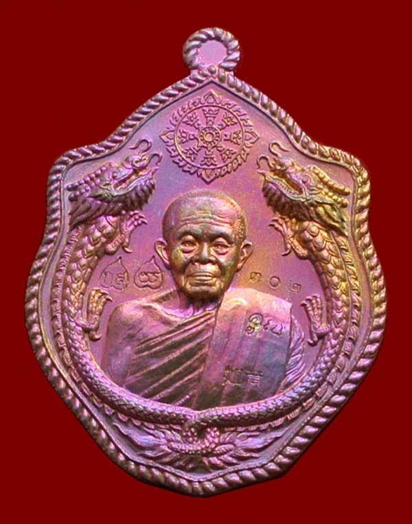 เหรียญมังกรคู่ สมปรารถนา เนื้อมหาชนวน โค๊ตทองคำ ในชุดทองคำลงยา N๐.302 สร้าง 666 เหรียญ พร้อมกล่อง