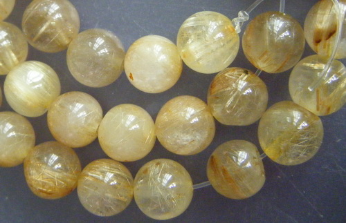 เม็ดหิน "แก้วไหมทอง" ขนาด 7 ม.ม. จำนวน 40 เม็ด สำหรับใช้ประกอบร้อยสร้อย