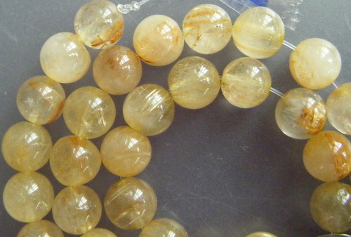 เม็ดหิน "แก้วไหมทอง" ขนาด 7 ม.ม. จำนวน 40 เม็ด สำหรับใช้ประกอบร้อยสร้อย