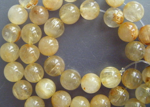 เม็ดหิน "แก้วไหมทอง" ขนาด 7 ม.ม. จำนวน 40 เม็ด สำหรับใช้ประกอบร้อยสร้อย