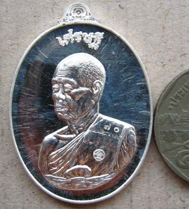 เหรียญเศรษฐี พระเทพวิทยาคม หลวงพ่อคูณ ปี2557 เนื้อเงินผิวกระจก หมายเลข70