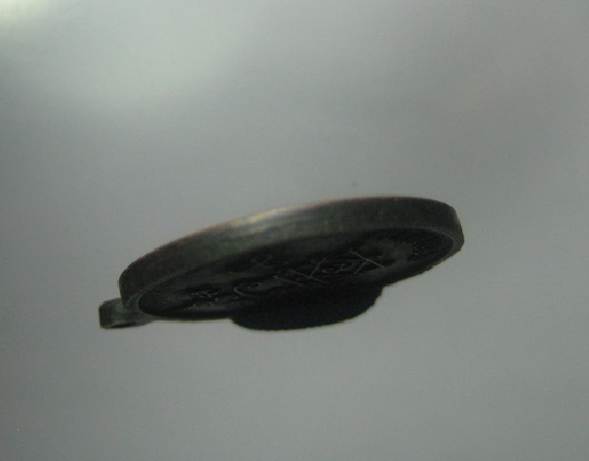 เหรียญแจกทาน หลวงพ่ออุ้น โค้ด อ