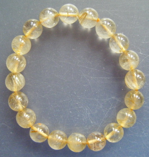 กำไลไหมทอง (หินนำโชคแห่งความร่ำรวย) เม็ดหินแก้วไหมทองขนาด 9 มม. 20 เม็ด