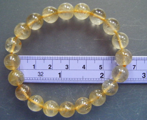 กำไลไหมทอง (หินนำโชคแห่งความร่ำรวย) เม็ดหินแก้วไหมทองขนาด 9 มม. 20 เม็ด