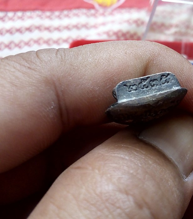 รูปหล่อใบโพธิ์ เนื้อเงิน  ศุภนิมิตร  หลวงปู่คำพันธ์ วัดพระธาตุมหาชัย  ปี35