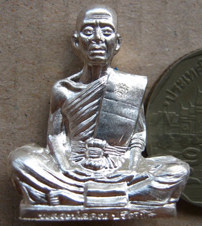 รูปเหมือนปั๊ม อรหันต์ สร้างบารมี๙๑ หลวงพ่อคูณ วัดบ้านไร่ ปี2557 เนื้อเงิน หมายเลข332 สร้าง666องค์