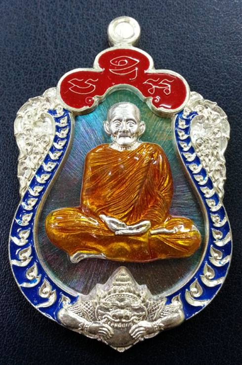 เหรียญเสมาหลวงปู่ฮก รุ่นสร้างบารมี๙๑ เนื้อนวะหน้ากากเงินลงยา ปะขอบเงินลงยา หลังยันต์จม No.79