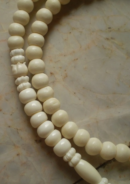 สร้อยกระดูกช้าง  ห่วงกลางหัวช้างทรงเครื่อง  เคาะเดียว 