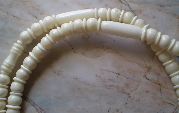 สร้อยกระดูก  ห่วงกลางหัวช้างทรงเครื่อง  เคาะเดียว 