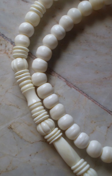 สร้อยกระดูก  ห่วงกลางหัวช้างทรงเครื่อง  เคาะเดียว 