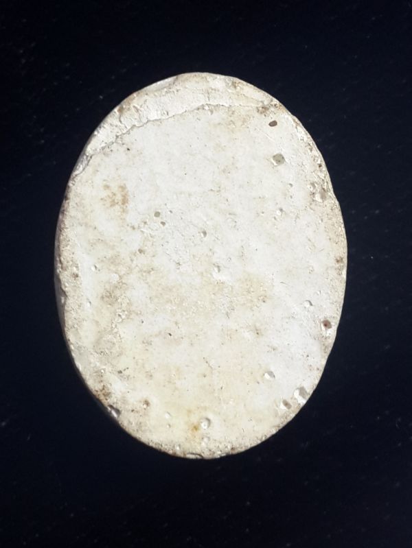 พระปิดตารูปไข่เนื้อผงพุทธคุณ หลวงปู่ดู่ วัดสะแก