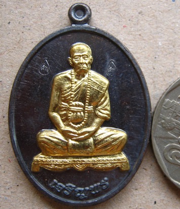 เหรียญเจริญพรล่าง หลวงปู่คำบุ วัดกุดชมภู จ อุบลราชธานี หมายเลข243