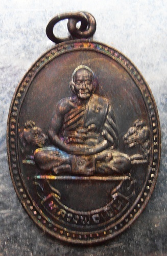 เหรียญหลวงพ่อเปิ่น4เหรียญปี34สวยๆผิวม่วงๆครับ