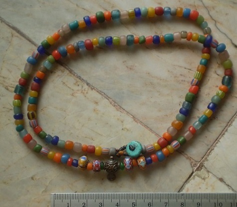 สร้อยลูกปัด  เชือกหนังเทียนถัก หัวขุนโลหะ  เคาะเดียว 