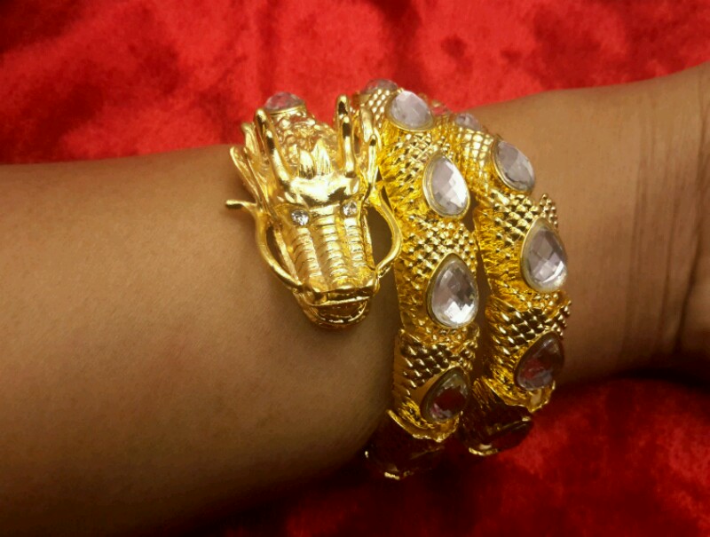 กำลังมังกรทอง ประดับ หินมงคล ใส