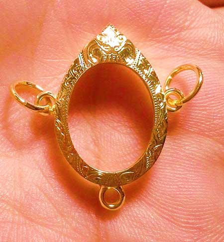 กรอบทองยกซุ้ม สามห่วง ใส่เหรียญเม็ดแตงหลวงปู่ทวด/ลป.หมุนนน.1.76กรัมราคา2750บาท