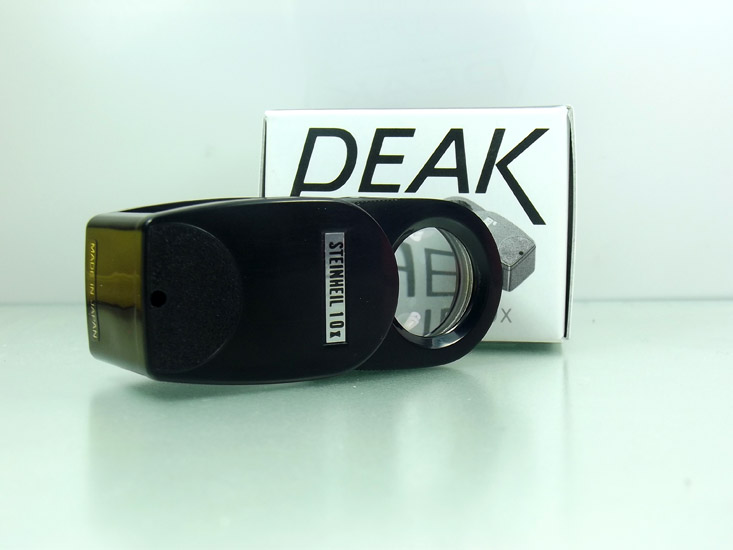 กล้องส่องพระยี่ห้อ PEAK (MAND IN JAPAN )เลนส์ 3 ชั้นเคลือบมัลติโค๊ตของแท้นำเข้าพร้อมจัดส่งEMS