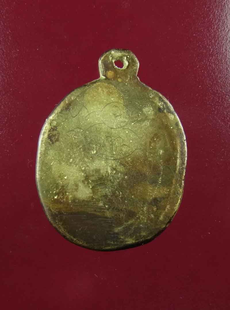 เหรียญหล่อโบราณ สมเด็จลุน วันเวินชัย แขวงจำปาศักดิ์ สปป.ลาว พิมพ์รูปไข่เล็ก เนื้อเปียกทอง  มีจาร 