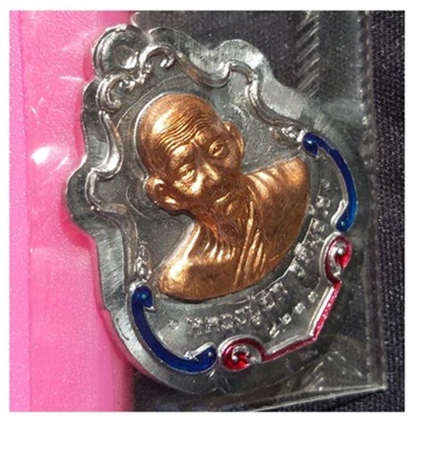 เหรียญปาดตาลหลวงปู่ฮกเนื้อตะกั่วไม่ตัดปีกหน้าทองแดงลงยา เบอร์4233 ปี58 สวยวิ้งเดิมๆ