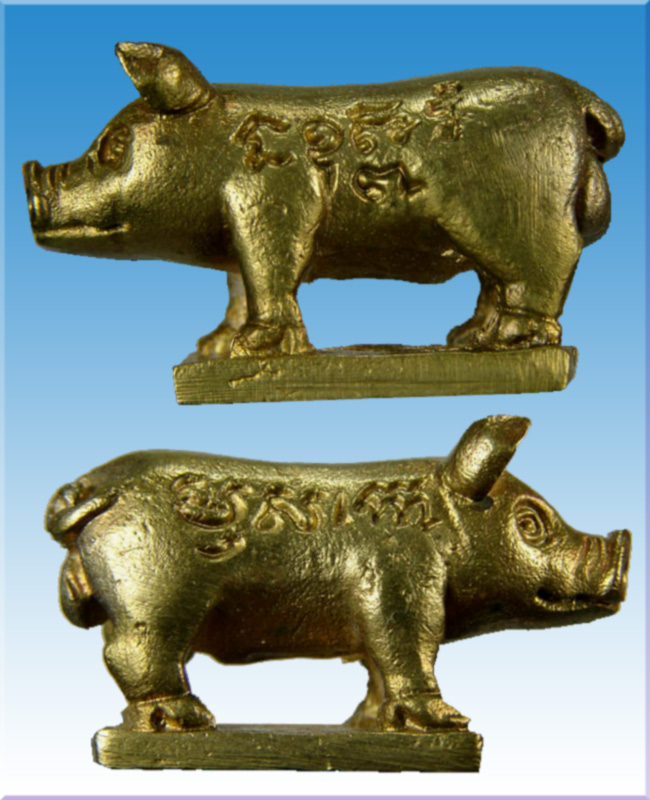 หมูหล่อเนื้อปลอกกระสุนปืน ปี 38 ใต้ฐานตอกโค๊ต หลวงพ่อสาคร วัดหนองกรับ