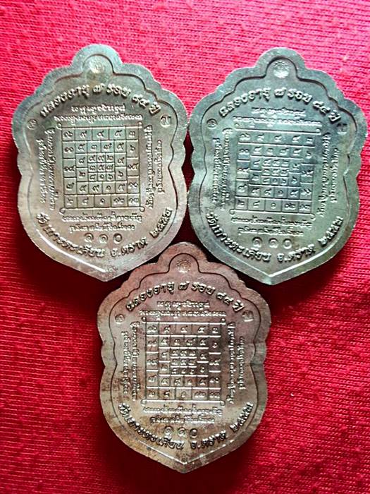 เหรียญเสมา หลวงปู่บัว “รุ่นครบ ๗ รอบ ถามโก” พ.ศ.๒๕๕๓ เนื้อนวะหน้ากากเงินลงยา