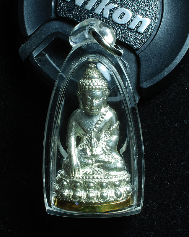พระกริ่งพยัคฆ์ทักษิณ (ก้นเสือ รุ่นแรก ) เงินก้นทอง หมายเลข ๖ จำนวนการสร้าง ๙ องค์