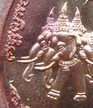 เหรียญเลื่อนฯบารมี หลวงพ่อจรัญ วัดอัมพวัน จ สิงห์บุรี ปี2557 หมายเลข150เนื้อทองทิพย์สอดไส้ทองแดง(แย