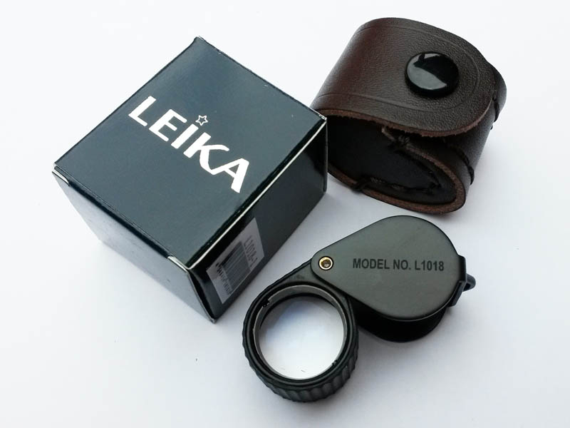 เคาะเดียวราคาพิเศษ..กล้อง*** leika10x18mm สีดำหุ้มยางสวยดุหรู (GERMAN)***นำเข้า*** เลนส์แก้ว3ชั้นเคล