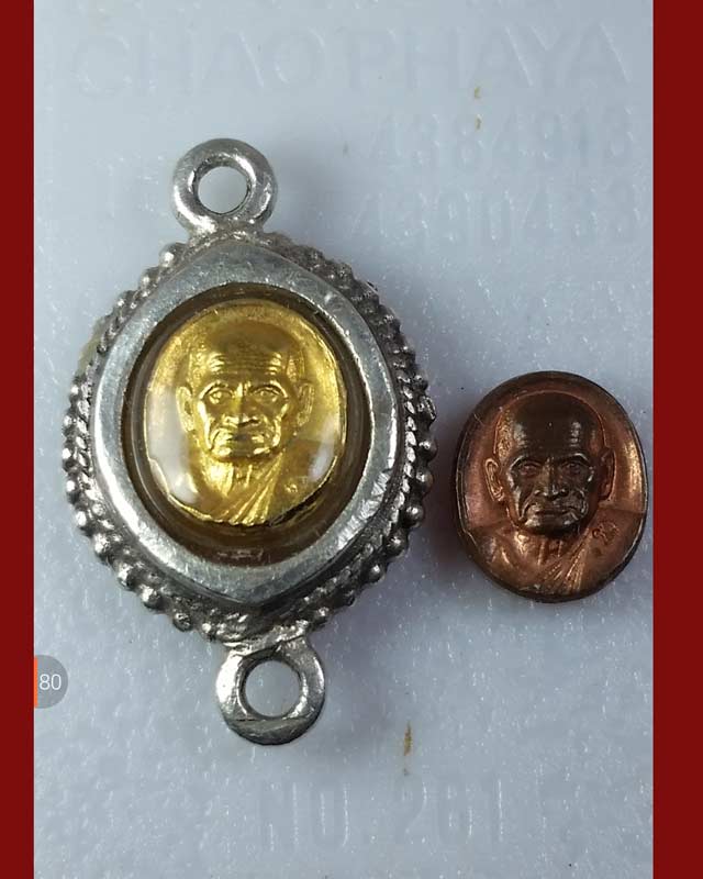 เหรียญเม็ดยาหลวงพ่อเงิน เนื้อกะไหล่ทองเลี่ยมเงิน+ทองแดง