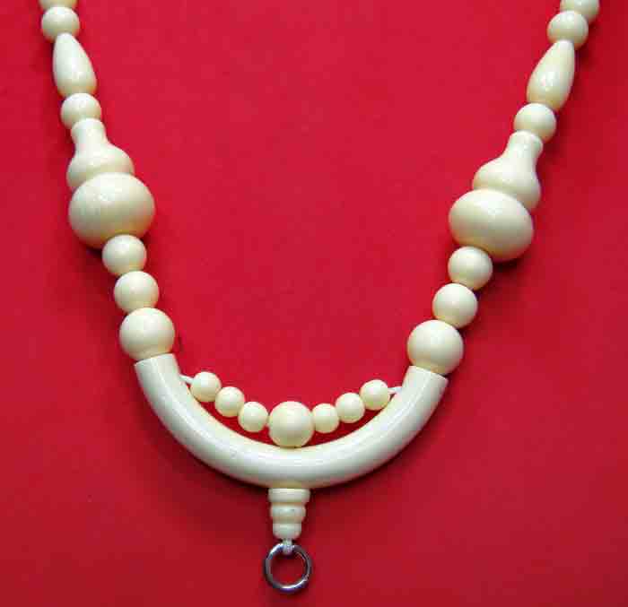 **สร้อยลูกประคำ เม็ดเรซิ่นลายงาช้าง 