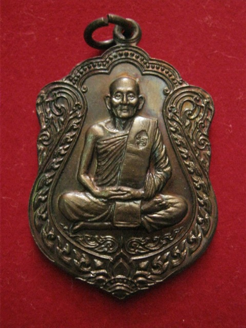 เหรียญทองแดง นพเกล้า หลวงปู่ม่น วัดเนินตามาก ชลบุรี ปี2535