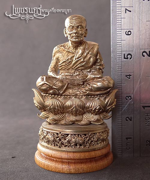 +++ พระบูชาหลวงปู่ทวดฐานบัว 4 ชั้นหนุนด้วยช้างมงคล 8 เชือกพร้อมฐานไม้สัก อุดกริ่ง สูง 6.8 เซน +++