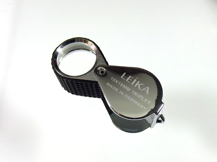 เคาะเดียวราคาพิเศษ..กล้อง*** leika10x18mm สีเงินหุ้มยางสวยดุหรู (GERMAN)***นำเข้า*** เลนส์แก้ว3ชั้น