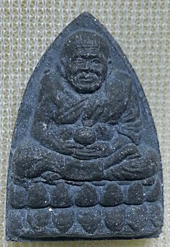 พระหลวงปู่ทวด หลวงปู่หมุน วัดบ้านจาน หลังพระพิฆเนศ ปางอิทธิฤทธิ์ ปี 2543 เนื้อแร่ผสมใบลาน