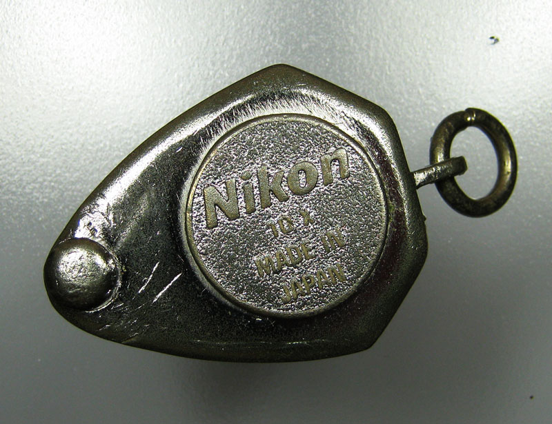 nikon รุ่นเก่า เลนส์ชั้นเดียว บอดีเงิน ชุบทองคำขาว เลนใสสาพดี ไม่มีรอย ภายนอกผ่านสนามมาเยอะ