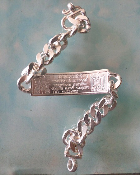 เลสหลวงพ่อรวย รุ่นเลื่อนสมณศักดิ์ ๒บาทหน้าทองคำ กรรมการ ป้ายแดง