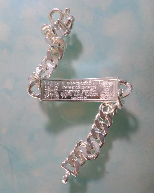 เลสหลวงพ่อรวย รุ่นเลื่อนสมณศักดิ์ ๒บาทหน้าทองคำ กรรมการ ป้ายแดง