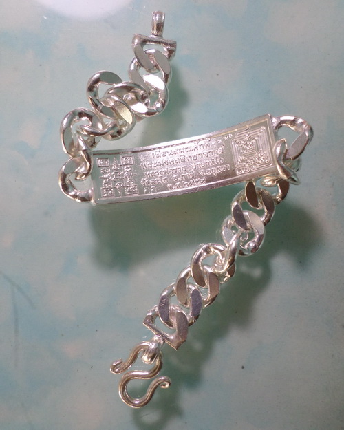 เลสหลวงพ่อรวย รุ่นเลื่อนสมณศักดิ์ ๒บาทหน้าทองคำ กรรมการ ป้ายแดง