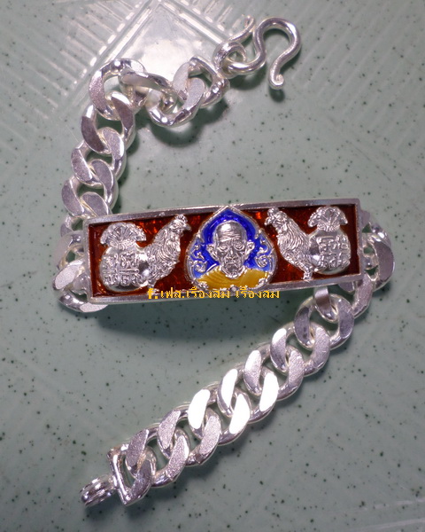 เลสหลวงพ่อรวย วัดตะโก ๒บาทลงยา ปี๕๗ รุ่นไตรมาส๙๓ เข้าแถวจำกัดจำนวนเช่าครับ ป้ายแดง