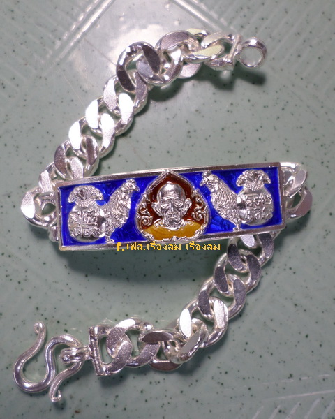 เลสหลวงพ่อรวย วัดตะโก ๒บาทลงยา ปี๕๗ รุ่นไตรมาส๙๓ เข้าแถวจำกัดจำนวนเช่าครับ ป้ายแดง