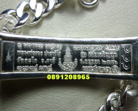 เลสหลวงพ่อรวย วัดตะโก ๒ บาทลงยา ตอง๔๔๔ ปี๕๖ รุ่นรวยเจริญสุข ป้ายแดง เลี่ยมเงินฝังพลอย