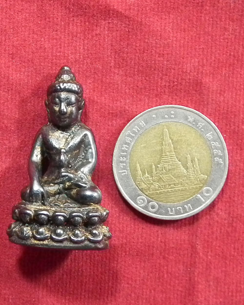 พระกริ่งไม่ทราบที่  เนื้อเมฆพัด