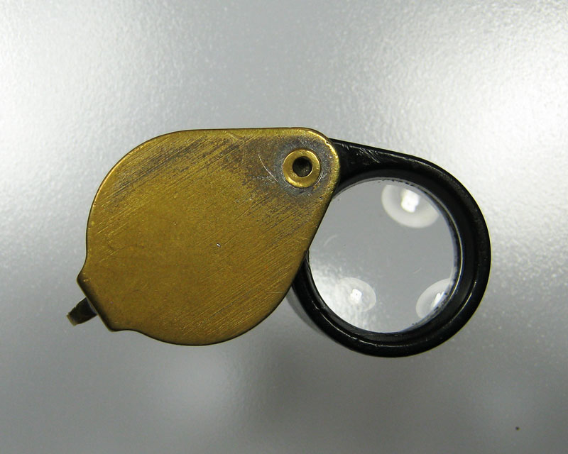 bausch & lomb 10x สามเหลี่ยมเล็ก ตัวรุ่นแรก สามเหลี่ยมขึ้น หลังเรียบ