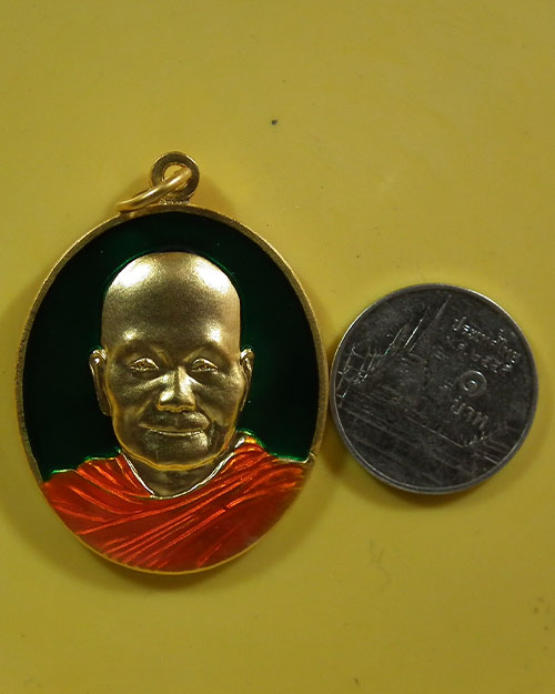 เหรียญรูปไข่ ฉลองอายุวัฒนะมงคล ๘๔ ปี หลวงพ่อจรัญ วัดอัมพวัน
